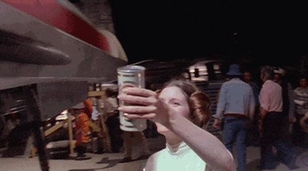 Leia passes a beer to Luke.gif