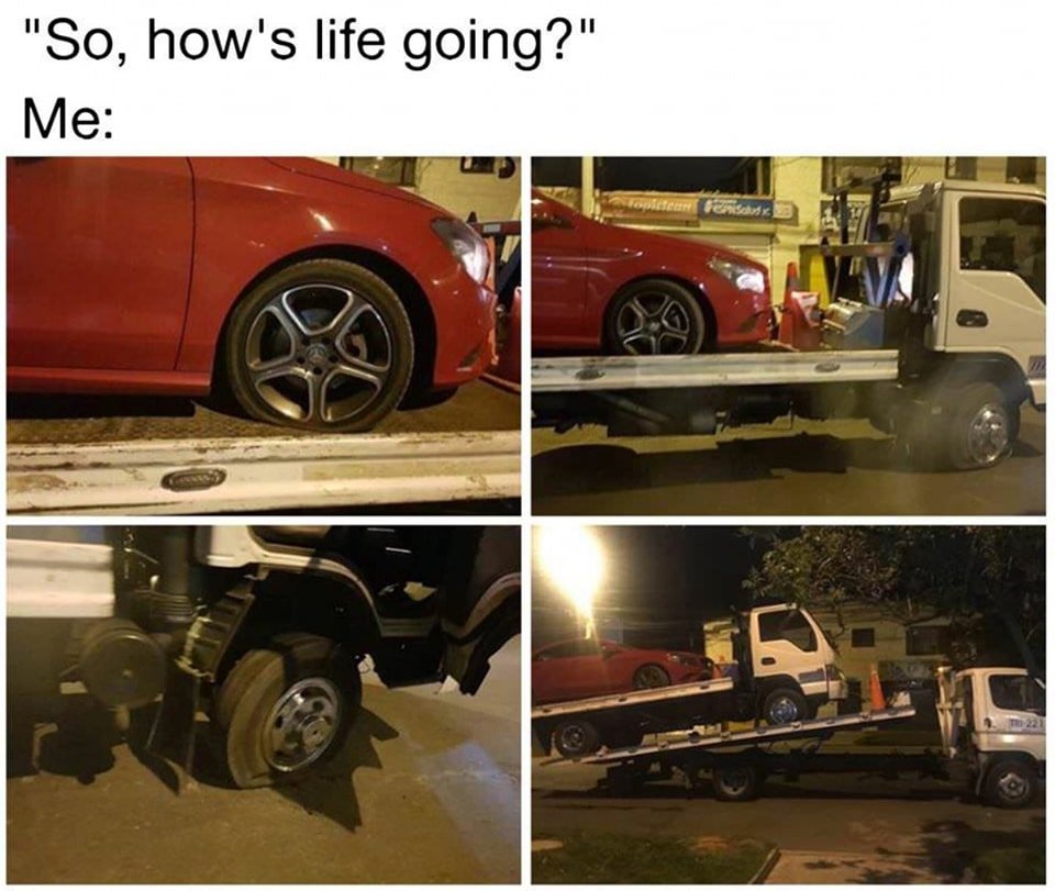 Tow truck towing a tow truck that's towing a car.jpg