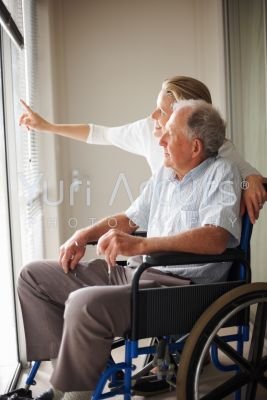 f19f8e015b307067fbbdcdf08f871516-wheelchair-pointing-senior-man-nurse-fit_400_400.jpg
