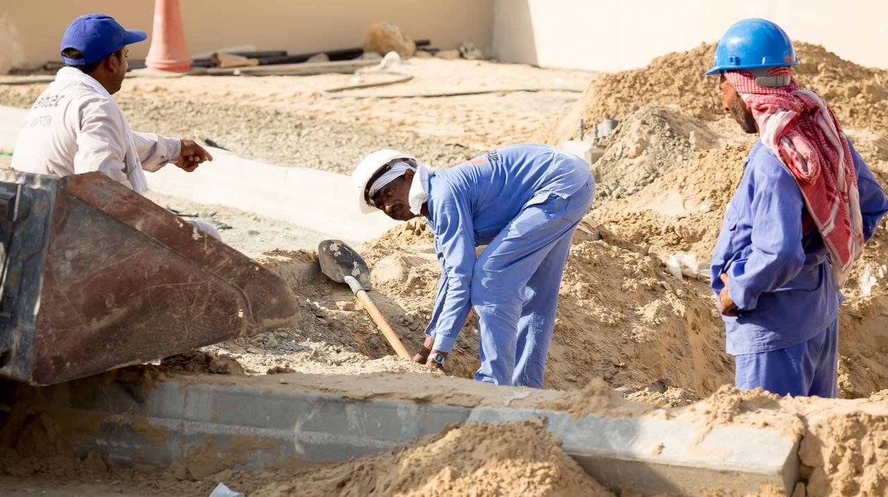 Dubai Labors at work.jpg